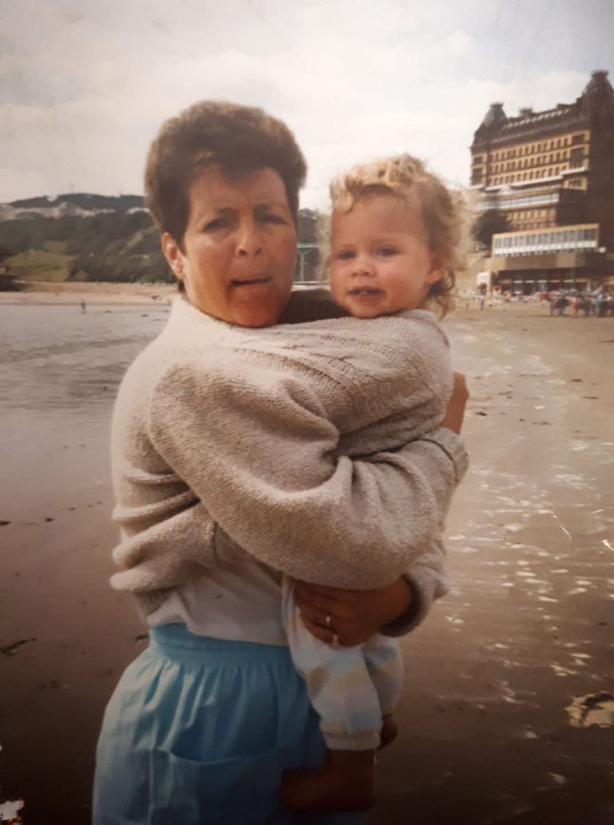 A young mum by the sea