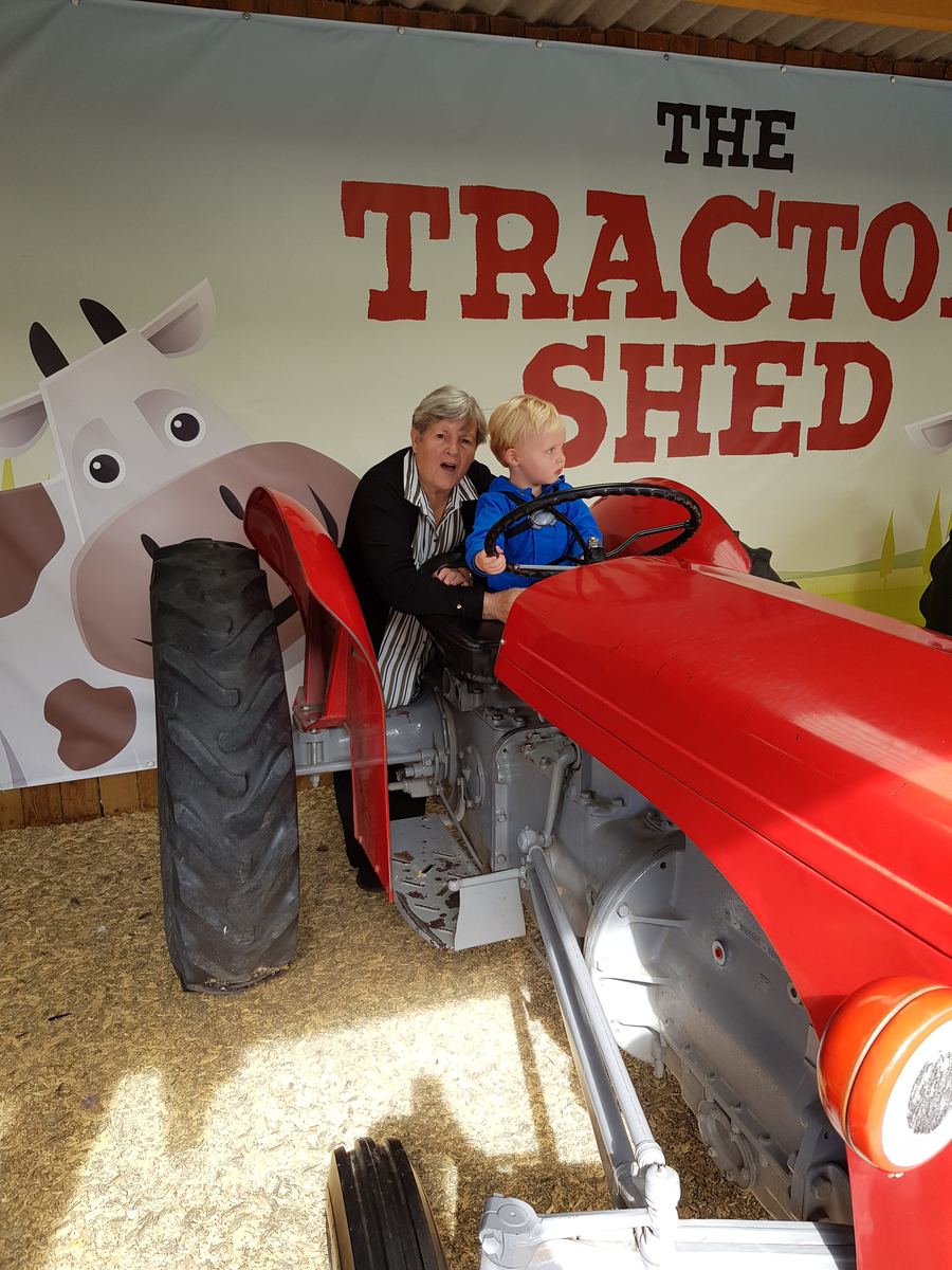 Playing farmer at the tractor shed
